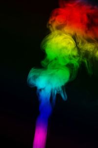 Close-up of light painting against black background
