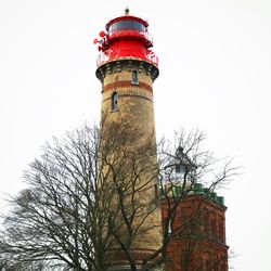 Low angle view of red building against sky