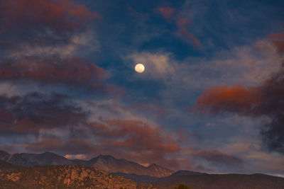 Scenic view of mountains against sky during sunset