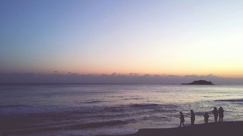 Scenic view of sea at sunset