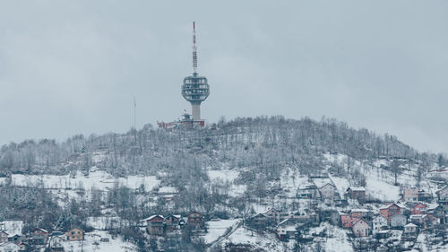 Buildings in city during winter