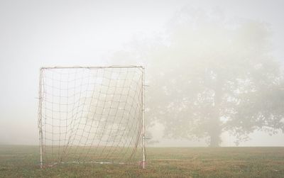Low angle view of soccer field against sky