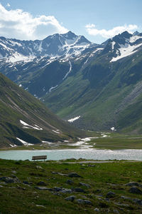 Scenic view of snowcapped mountains against sky