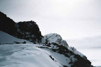 Snowy mountain peak during storm