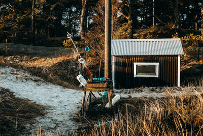 Fishing equipment and a building in the background. 