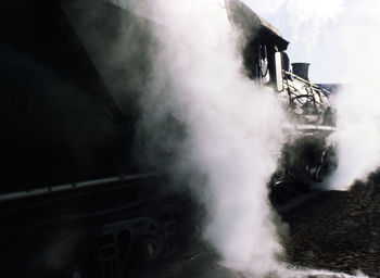 Steam train on railroad track