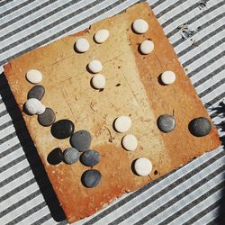 High angle view of pebbles on table