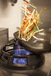 Close-up of meat in cooking pan