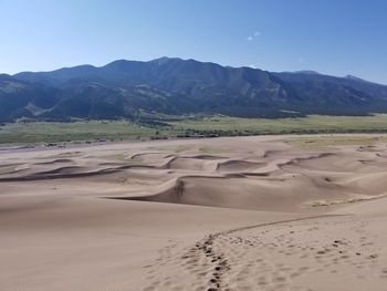 Scenic view of desert against sky