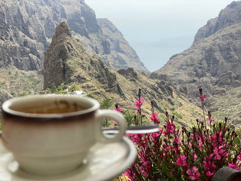 Coffee time with beautiful view and mountains in background