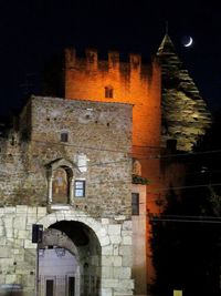 Low angle view of building at night