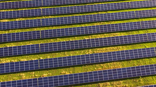 Aerial drone view flight over solar power station panels. aerial top view of solar farm. 