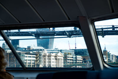 Close-up of city seen through window