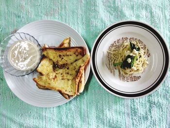 High angle view of breakfast served on table