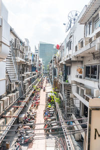 High angle view of street amidst buildings in city