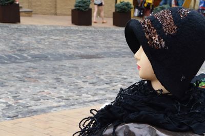 Close-up of hat on mannequin
