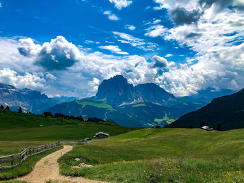 Sunny landscape of dolomite alps mountains, italy.