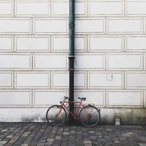 Bicycle parked on sidewalk