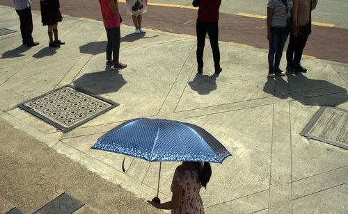 Low section of people walking outdoors