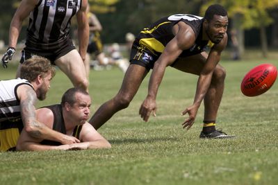 Men playing with ball