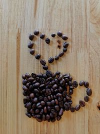 High angle view of coffee beans on table