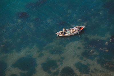 High angle view of boat sailing in sea