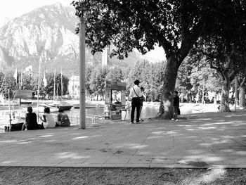 Woman walking on footpath