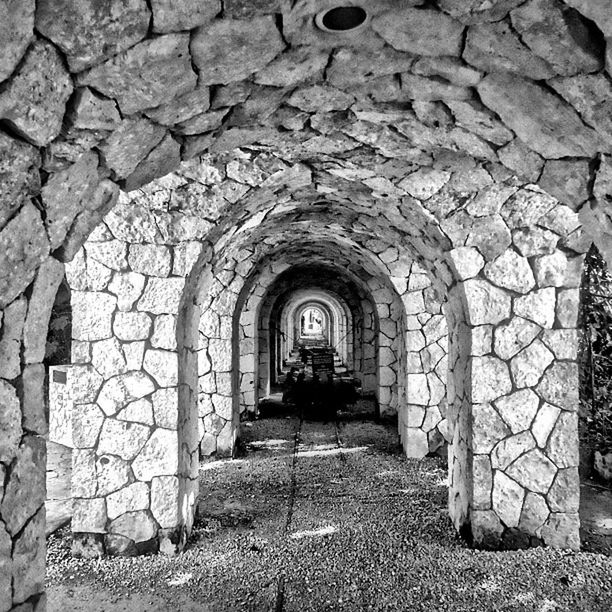 arch, architecture, built structure, the way forward, archway, indoors, stone wall, history, diminishing perspective, entrance, old, arched, day, cobblestone, building exterior, wall - building feature, brick wall, stone material, tunnel, no people