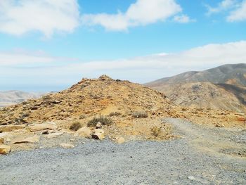 Scenic view of desert against sky