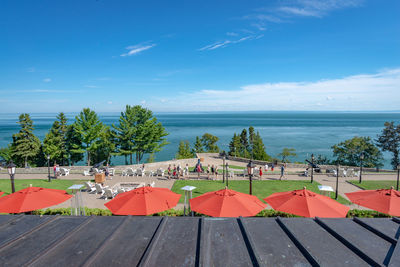 Scenic view of beach against blue sky