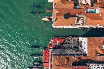 Top down view of moored empty venetian gondolas