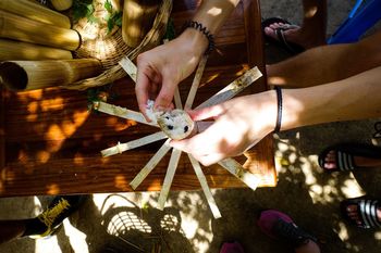 Cropped image of woman having food at table