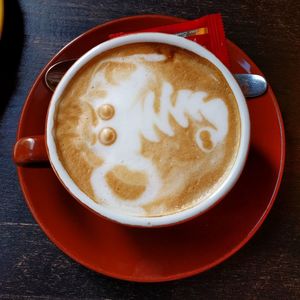 High angle view of cappuccino on table