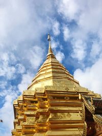 Low angle view of temple building against cloudy sky