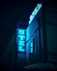 Low angle view of illuminated building at night