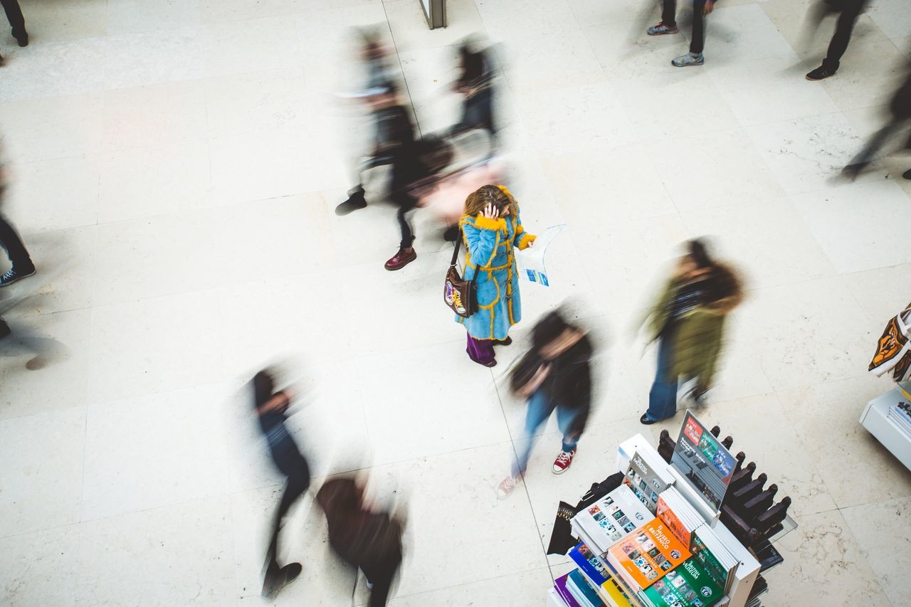 lifestyles, leisure activity, full length, men, fun, person, street, motion, enjoyment, childhood, girls, boys, large group of people, playing, walking, skill, togetherness, blurred motion, day