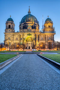 The illuminated berliner dom, germany, just before sunrise