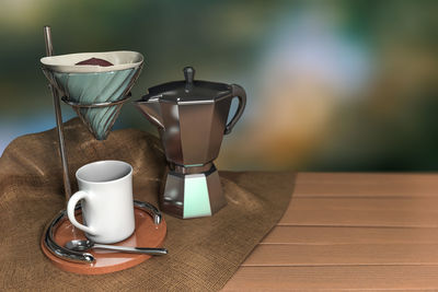 Close-up of coffee cup on table