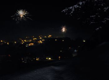 Firework display at night