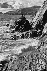 People on beach against sky