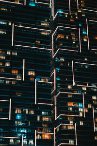 Full frame shot of illuminated buildings at night