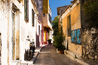 Narrow street amidst buildings in town