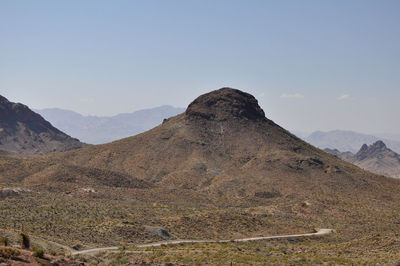 Scenic view of mountains against clear sky