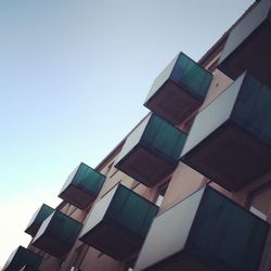 Low angle view of building against blue sky