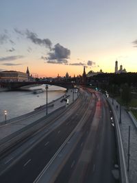 View of bridge over river against sky during sunset