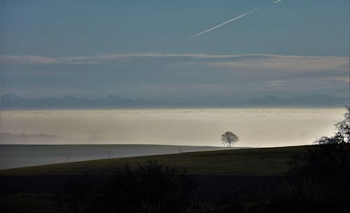 Scenic view of landscape against sky during sunset
