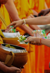 Close-up of man holding food