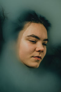 Close-up of young woman in bathtub