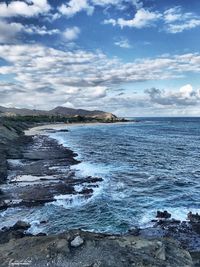 Scenic view of sea and cloudy sky