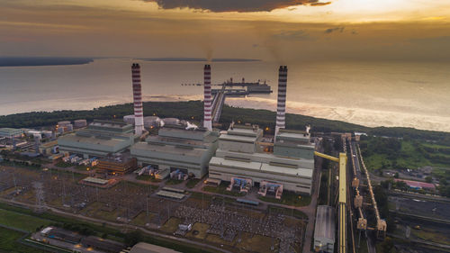 High angle view of factory at sunset